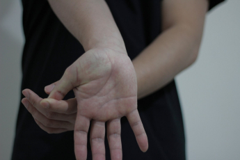 Exercise 3: Gently pull your wrist backwards by the thumb, feeling the stretch in your wrist and palm