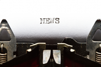 The word 'news'  was typed by a typewriter.